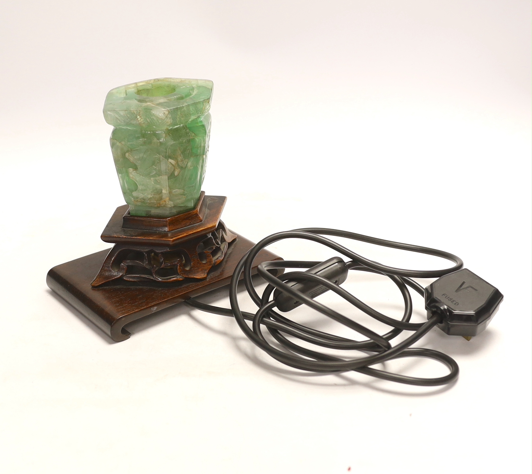 A Chinese green quartz and carved hardwood table lamp